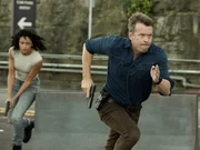 &ldquo;Heart Starter&rdquo; &ndash; NCIS: Sydney will do whatever it takes to crack the case of a rogue assassin on the run during NCIS Special Agent DeShawn Jackson&rsquo;s chaotic first day as boss. L-R: Olivia Swann as NCIS Special Agent Captain Michelle Mackey and Todd Lasance as AFP Liaison Officer Sergeant Jim 'JD' Dempsey in NCIS: Sydney episode 1, season 2.