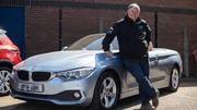 Mike poses with BMW 4 series in black jacket Mike poses with BMW 4 series in black jacket