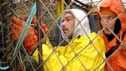 Deckhands Eddie Uwekoolani and Mike Fourtner on the Time Bandit.