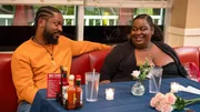 Jol Trammell and Nesha Harris smirk and smile at each other. Jol Trammell and Nesha Harris smirk and smile at each other.