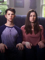 The Fuss children sitting on the couch. The Fuss children sitting on the couch.