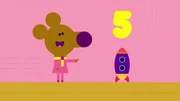 Duggee und die Quirlies wollen bis 100 z&auml;hlen. Nora findet eine Rakete als 5. Gegenstand.