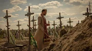 Ein Priester bestattet die ukrainischen Zivilisten, die von russischen Soldaten in Butscha ermordet wurden. Ein Priester bestattet die ukrainischen Zivilisten, die von russischen Soldaten in Butscha ermordet wurden.