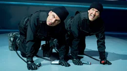 L-R: Johnny English (Rowan Atkinson), Angus Bough (Ben Miller).