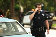 Officer John Nolan (Nathan Fillion).