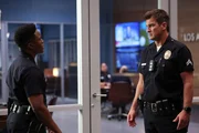 l-r: Aaron Thorsen (Tru Valentino), John Nolan (Nathan Fillion)