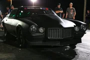 Monza pulls his car to the starting line before his race against Dominator for the Number 10 spot. Monza pulls his car to the starting line before his race against Dominator for the Number 10 spot.