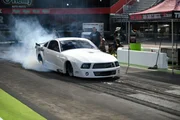 Kayla Morton performs a burnout. Kayla Morton performs a burnout.