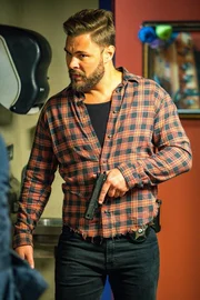Adam Ruzek (Patrick John Flueger)
