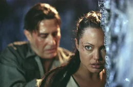L-R: Jonathan Reiss (Ciar&aacute;n Hinds), Lara Croft (Angelina Jolie)