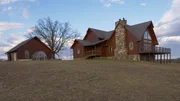 The exterior of the Lakeshore Cabin in Tennessee, as seen on HGTV's Log Cabin Living The exterior of the Lakeshore Cabin in Tennessee, as seen on HGTV's Log Cabin Living