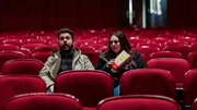 Jack Osbourne looks shocked as he and Katrina Weidman sit in the House Auditorium of Savannah Theatre