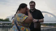 Sheena Peñaranda cries in her hands upset with news that immigration will be difficult. Sheena Peñaranda cries in her hands upset with news that immigration will be difficult.