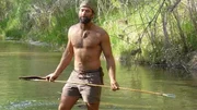 Matt fishing in a river.