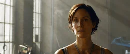 Trinity / Tiffany (Carrie-Anne Moss).