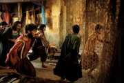 In Panik geratene Einwohner von Pompeji fliehen durch die Stadttore, um dem Vulkanausbruch zu entkommen. (National Geographic/Darrin Zammit Lupi)