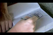 Corentin de Chatelperron l&auml;sst sich in Auroville in Indien das Prinzip des simplen, sparsamen Kochers erkl&auml;ren.