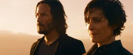 v.li: Neo / Thomas Anderson (Keanu Reeves), Trinity / Tiffany (Carrie-Anne Moss)