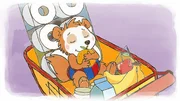 Bobo macht ein Nickerchen im Einkaufswagen.