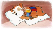Nach dem Spielen in seiner H&ouml;hle schl&auml;ft Bobo zufrieden ein.