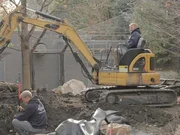 Brian on the excavator and Chris working on the wolf exhibit at the Lincoln Park Zoo. The guys are renovating the red wolf exhibit that currently has some serious draining issues.