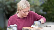 Host Jasmine Roth applies oil to a 200 year old olive burl coffee table, as seen on HGTV's Hidden Potential. Host Jasmine Roth applies oil to a 200 year old olive burl coffee table, as seen on HGTV's Hidden Potential.