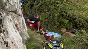 Ep106 - Paramedics carrying patient Michelle on a stretcher.