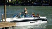 Beth and Dimitry enjoy boating on the lake with their kids. Beth and Dimitry enjoy boating on the lake with their kids.