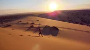 Matt Graham getting a bit of exercise as the African sun rises over the Namibia desert peaks.