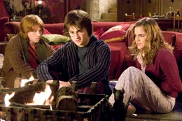 Rupert Grint (Ron Weasley), Daniel Radcliffe (Harry Potter), Emma Watson (Hermione Granger).