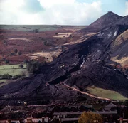 ABERFAN 1966: The moving mountain of coal sludge after the disaster at Aberfan when the coal tip avalanched through the Pantglas Junior School, killing 116 children and 28 adults. (Photo by PA Images via Getty Images)