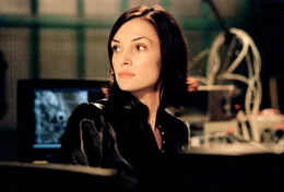 Rachel (Famke Janssen)