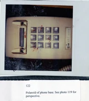 Beweismittel - Polaroid des Telefonsockels