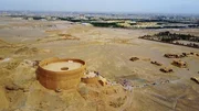 an ancient tower on a hill in Iran