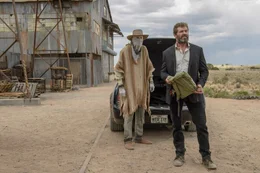 L-R: Caliban (Stephen Merchant) and  Logan (Hugh Jackman)