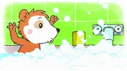 Bobo spielt mit dem Schaum in der Badewanne.