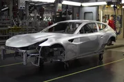 Maranello, Italy - Body welding of a nearly finished Ferrari FF body. Maranello, Italy - Body welding of a nearly finished Ferrari FF body.