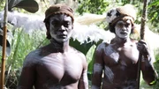 Portrait of two Asmat tribe members Portrait of two Asmat tribe members