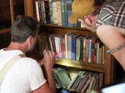 Jay and Mark are looking at books. Jay and Mark are looking at books.