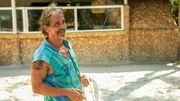 Heino smiling on the volleyball court of Soul Breeze during mast repairs Heino smiling on the volleyball court of Soul Breeze during mast repairs