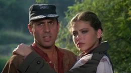 Die Mail&auml;nderin Lisa (Ornella Muti) versucht den Weinbauer Elia (Adriano Celentano) zu z&auml;hmen.