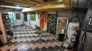 Basement of the Joe and Jacks Amazing Technicolor Prison house