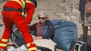 Paramedics with patient Pauline. Paramedics with patient Pauline.