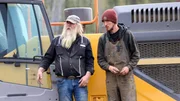 Tony Beets and Jacob Flood stood on side of excavator on tracks Tony Beets and Jacob Flood stood on side of excavator on tracks