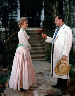 L-R: Hannah Hunter (Constance Towers), Maj. Henry Kendall (William Holden)