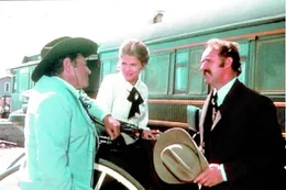 Melissa Ruger (Candice Bergen, Mi.) und Brandt Ruger (Gene Hackman, re.)