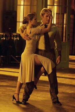 Paulina (Jennifer Lopez, l.); John Clark (Richard Gere, r.)