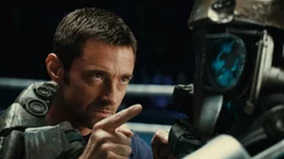 Der Boxsport hat sich radikal ver&auml;ndert. Nicht Menschen, sondern gigantische Stahlkolosse treten im Ring an. Der ehemalige Boxer Charlie Kenton (Hugh Jackman). versucht mit seinen einfachen Kampfmaschinen in Untergrundk&auml;mpfen zu siegen. Ein frustrierendes Unternehmen - aber dann passiert etwas Unerwartetes ...