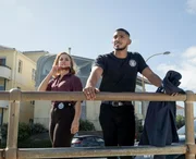 L-R: Tuuli Narkle as AFP Liaison Officer Constable Evie Cooper and Sean Sagar as Special Agent DeShawn Jackson in NCIS: Sydney season 1, episode 1. L-R: Tuuli Narkle as AFP Liaison Officer Constable Evie Cooper and Sean Sagar as Special Agent DeShawn Jackson in NCIS: Sydney season 1, episode 1.