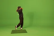 London, UK: A golf professional performing a golf swing. London, UK: A golf professional performing a golf swing.